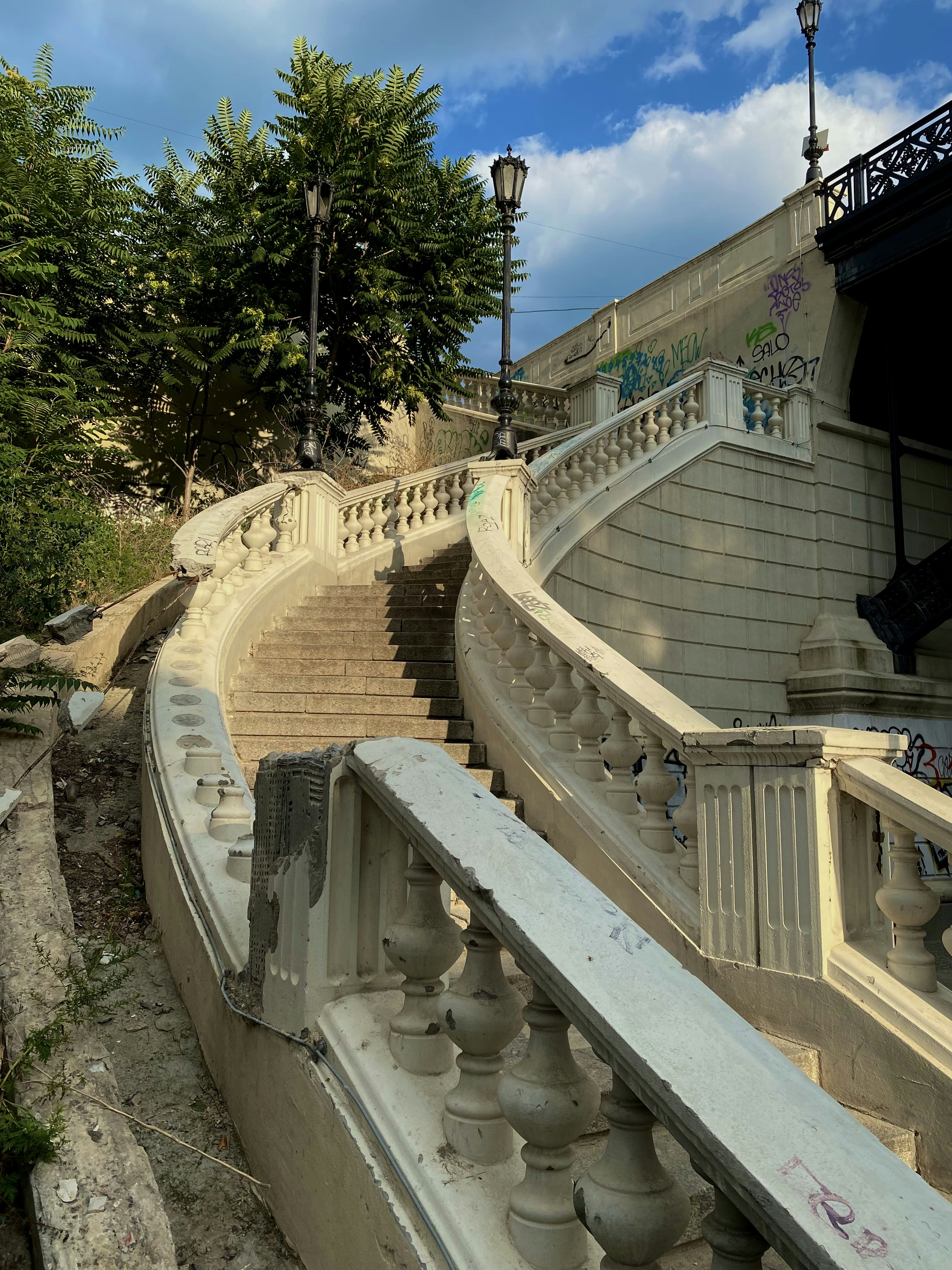 a stone staircase with a railing