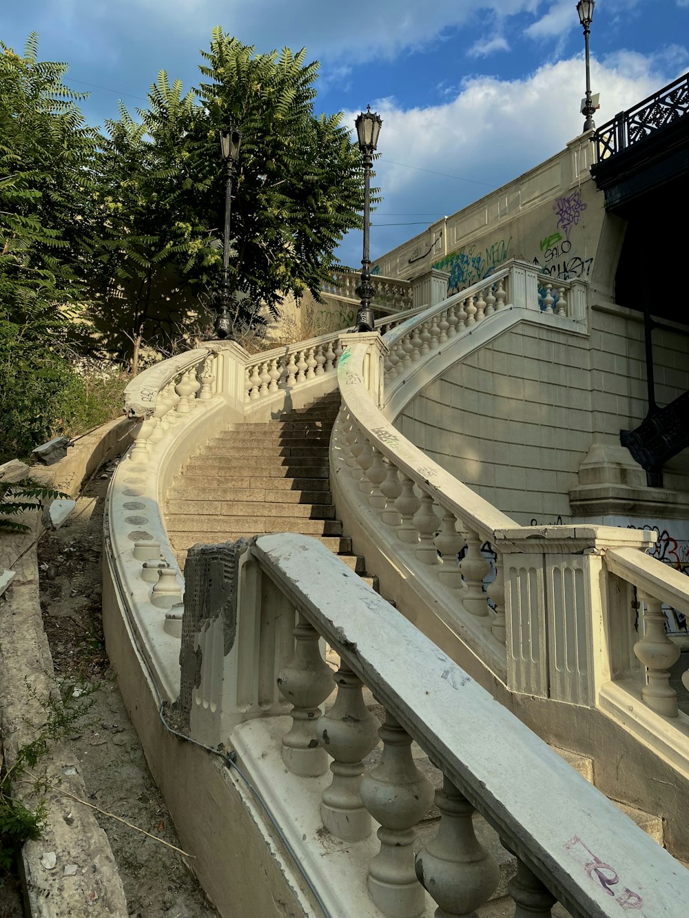 a stone staircase with a railing