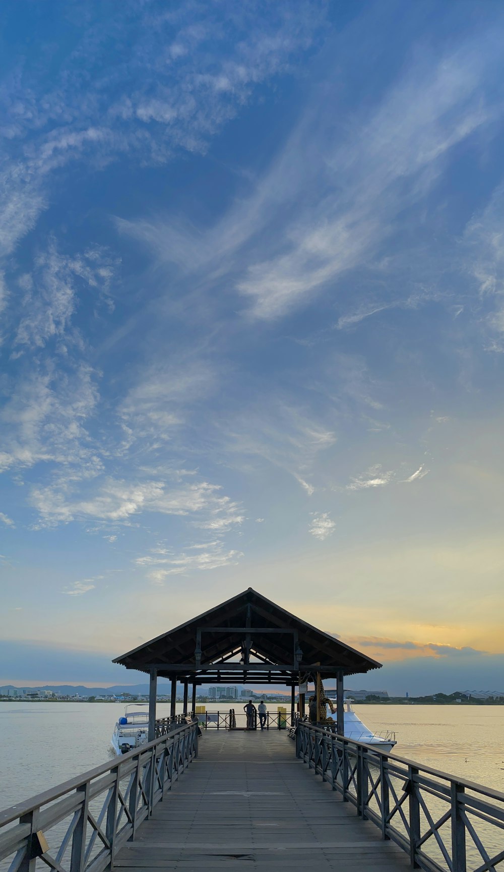 a pier with a building on it