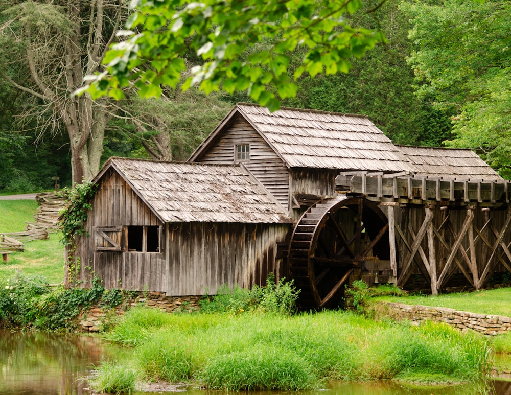 a wooden house with a wheel