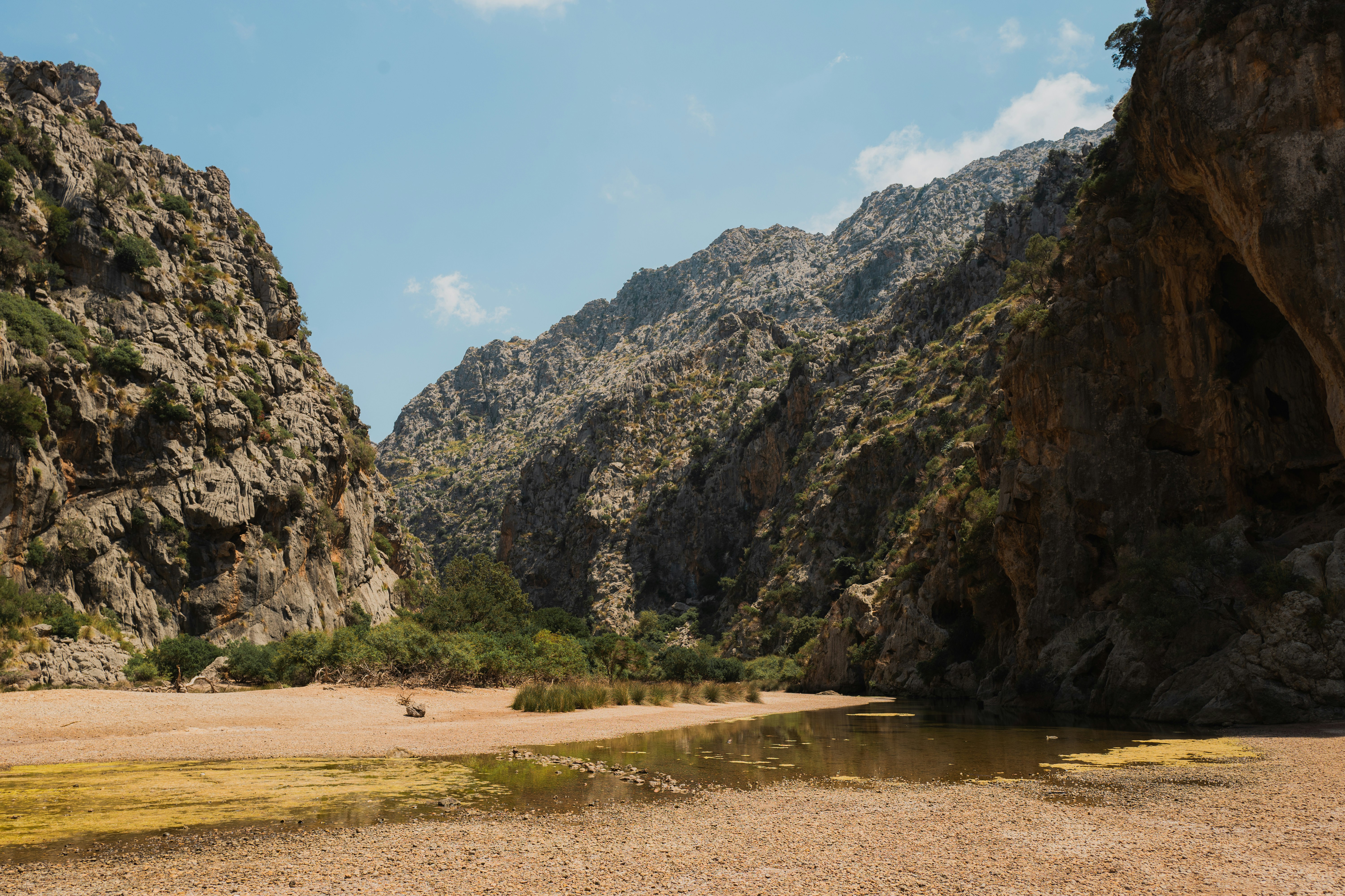 a river running between rocky mountains