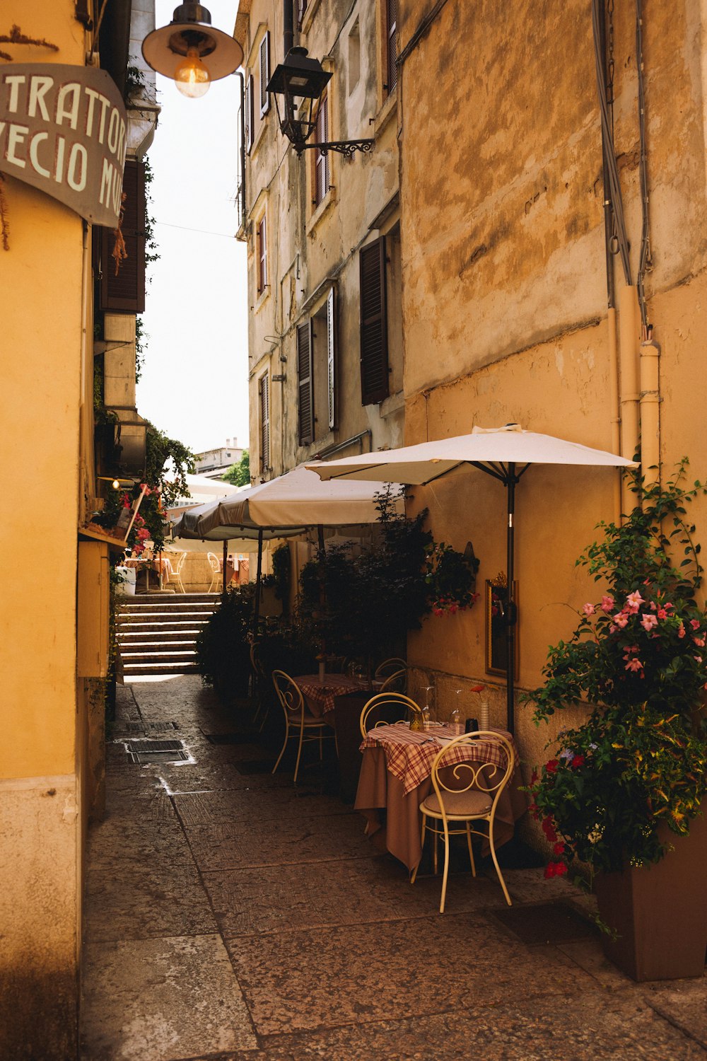 a street with tables and chairs