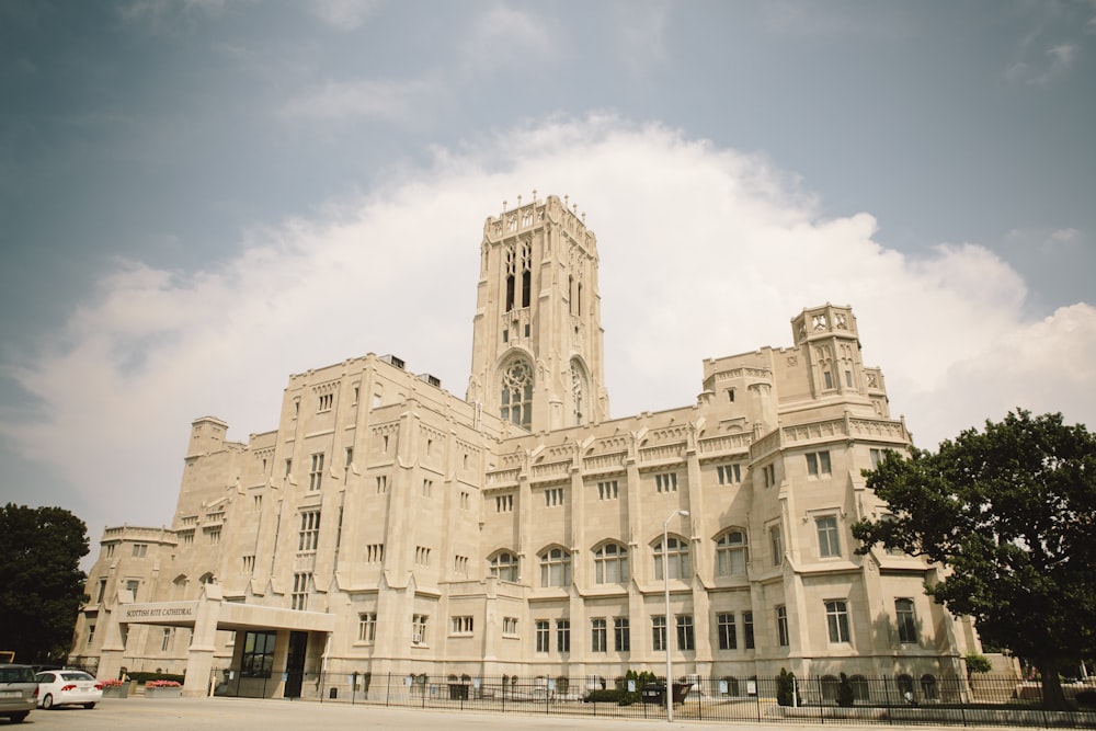 a large white building with a tower