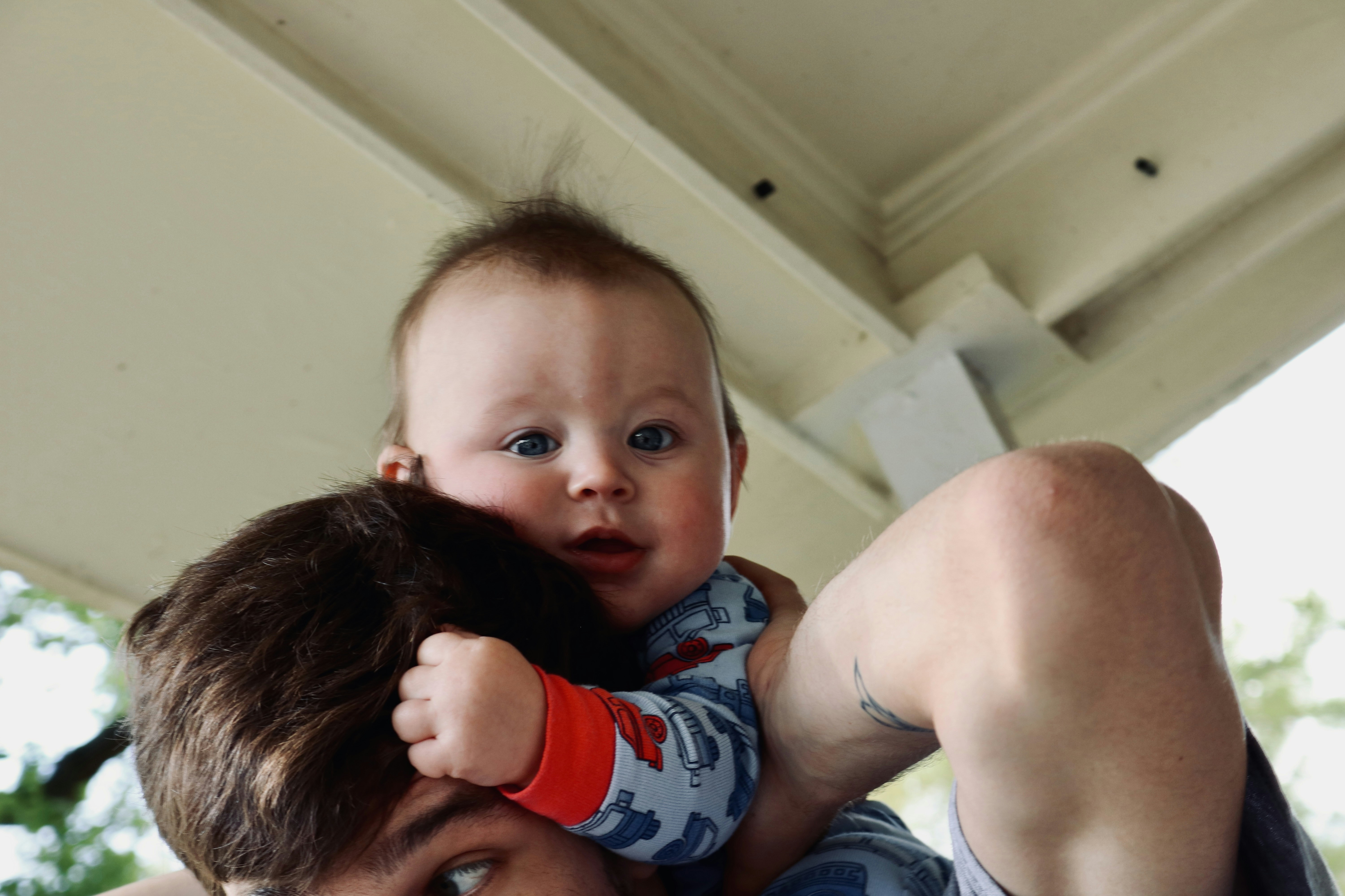 a person holding a baby