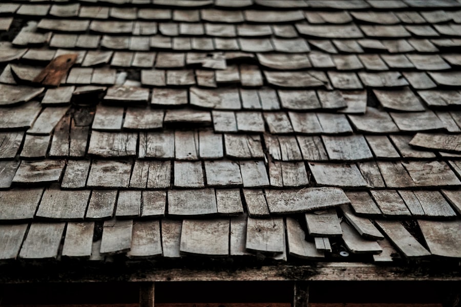 Damaged roof with missing shingles before tornado restoration in Stones River — before