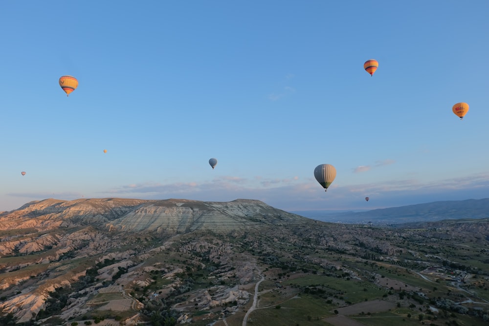 a group of hot air balloons in the sky