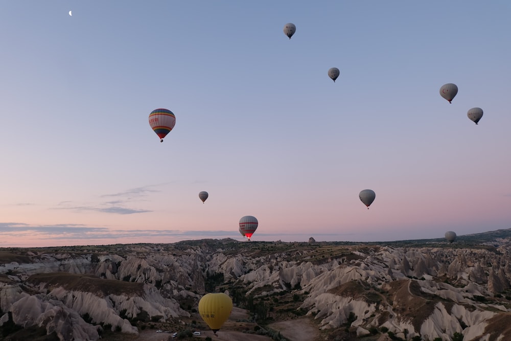 a group of hot air balloons in the sky