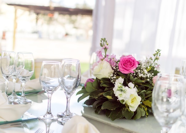 An elegant table setting adorned with fresh flowers.