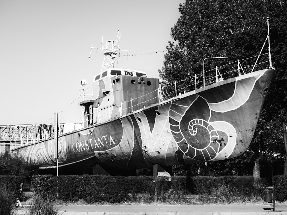 a large ship with graffiti on it