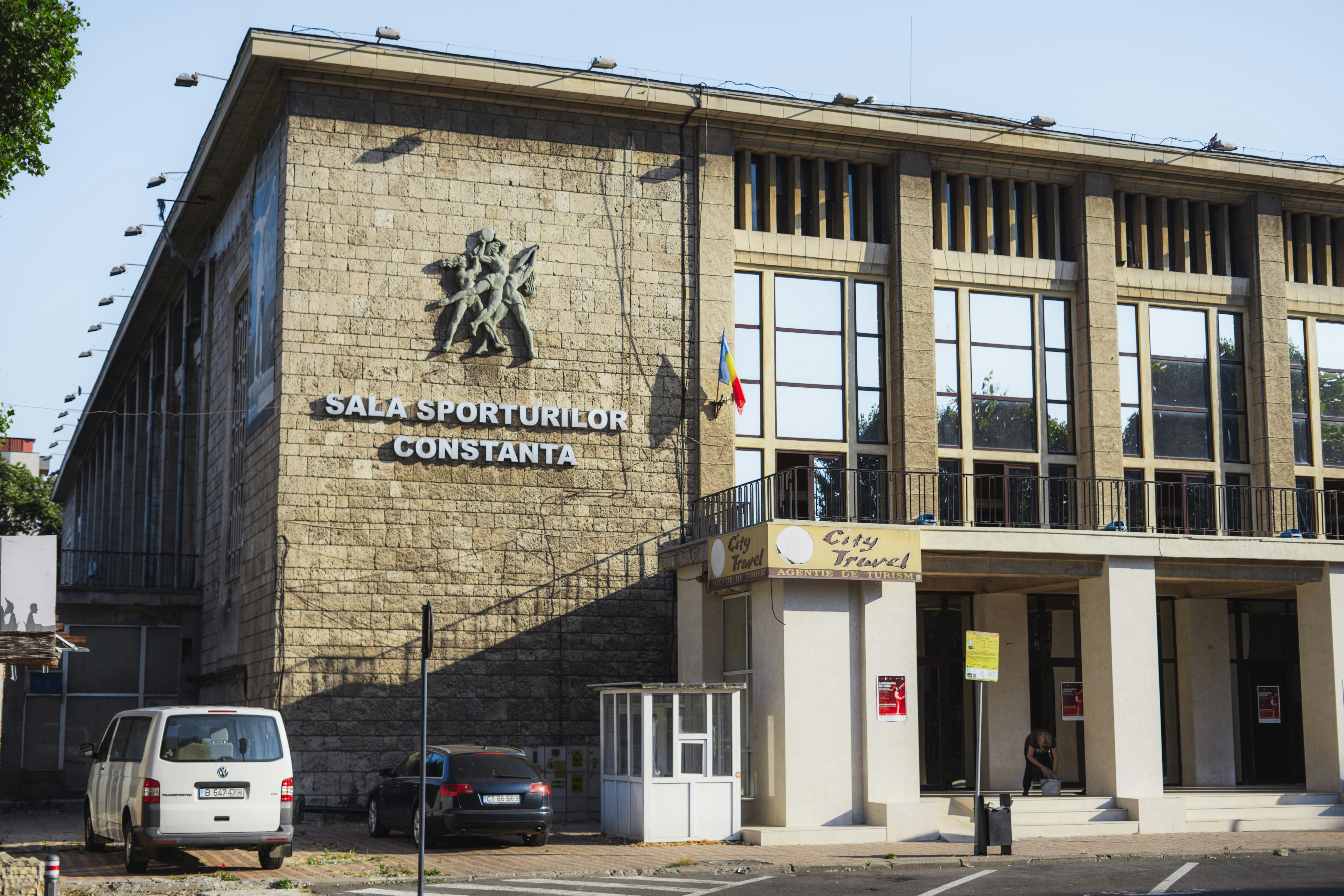 a building with a flag on the front