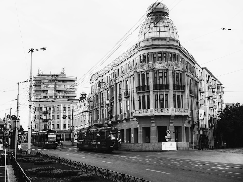 a black and white photo of a building with a dome on top