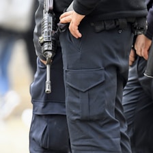 a person holding a gun