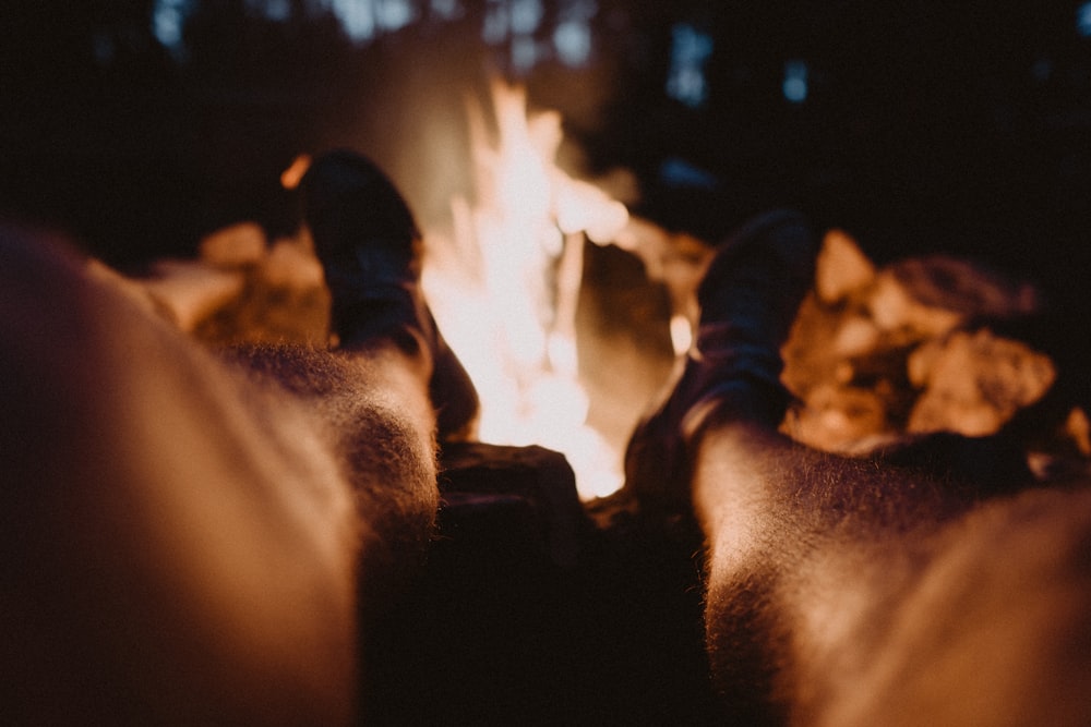 a group of people around a fire