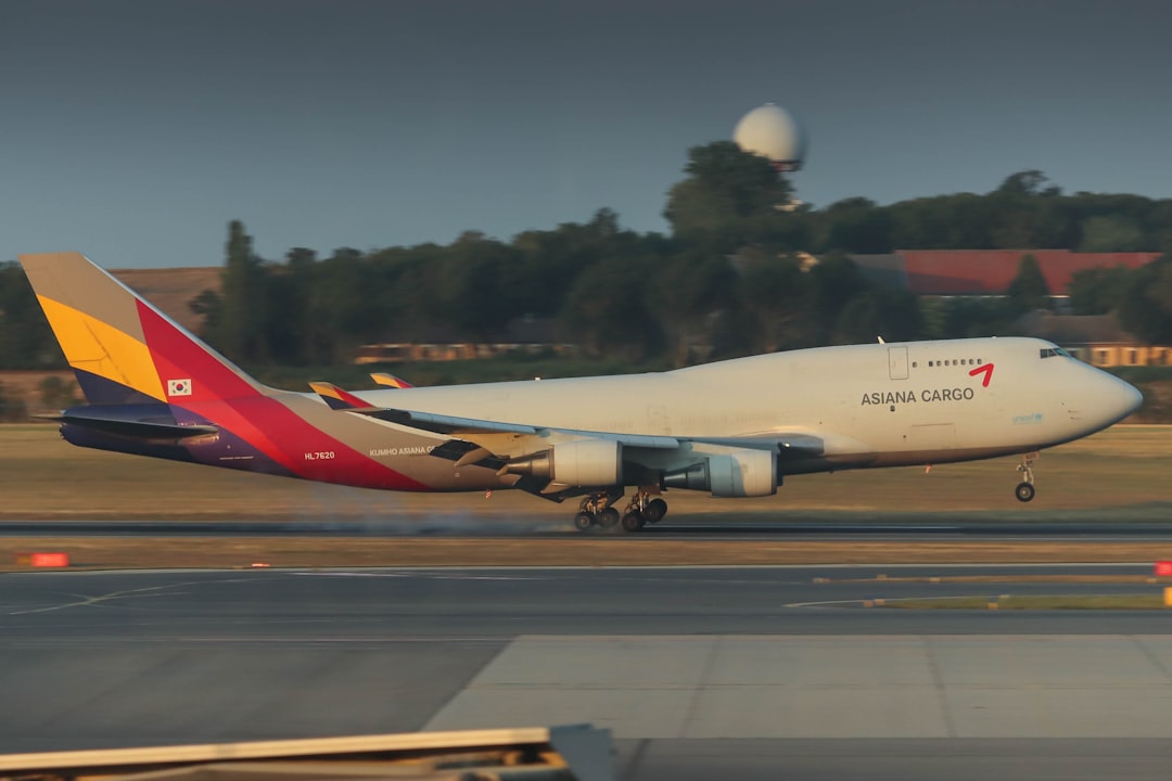 a large airplane on a runway,