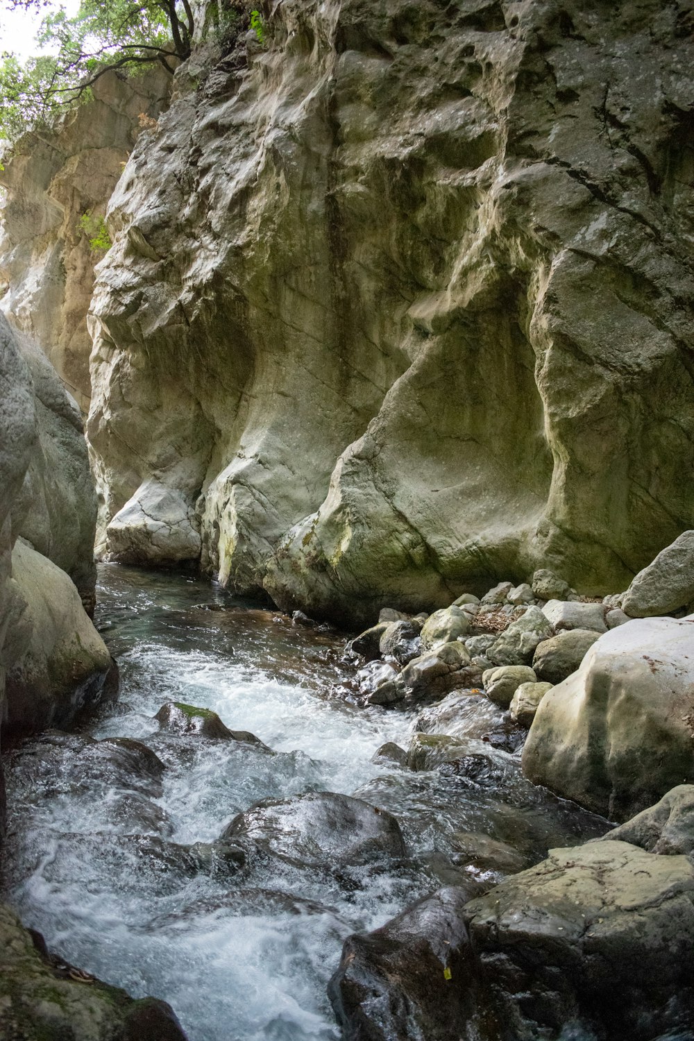 a river flowing between large rocks