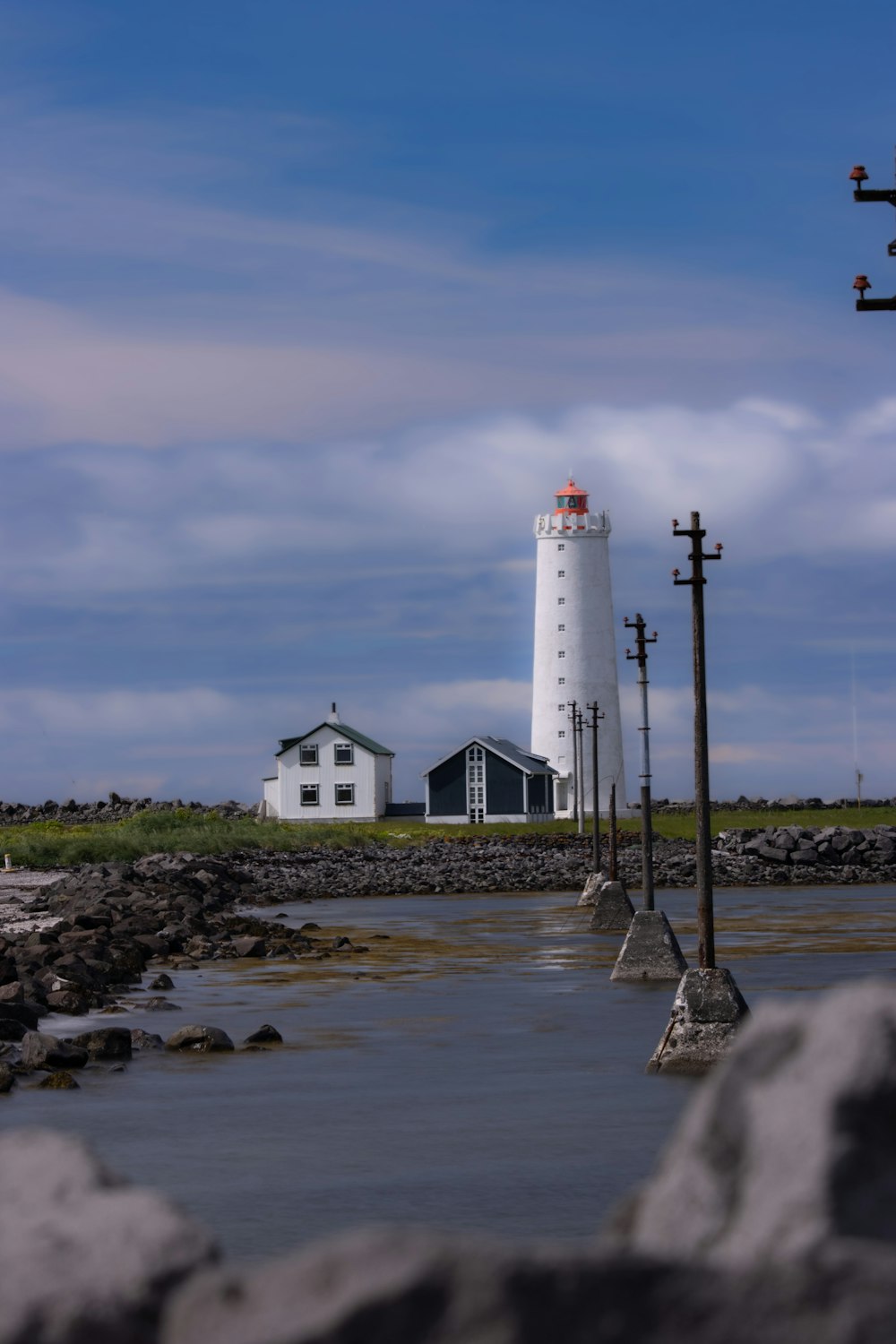 a lighthouse on a rocky shore