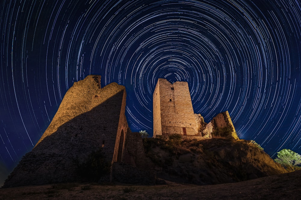 a pyramid with stars in the sky