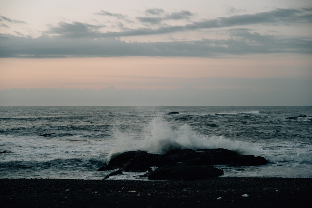 waves crashing on rocks