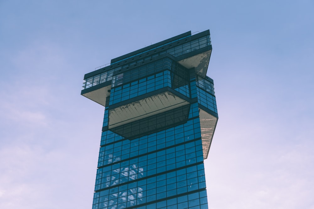 a tall building with glass windows