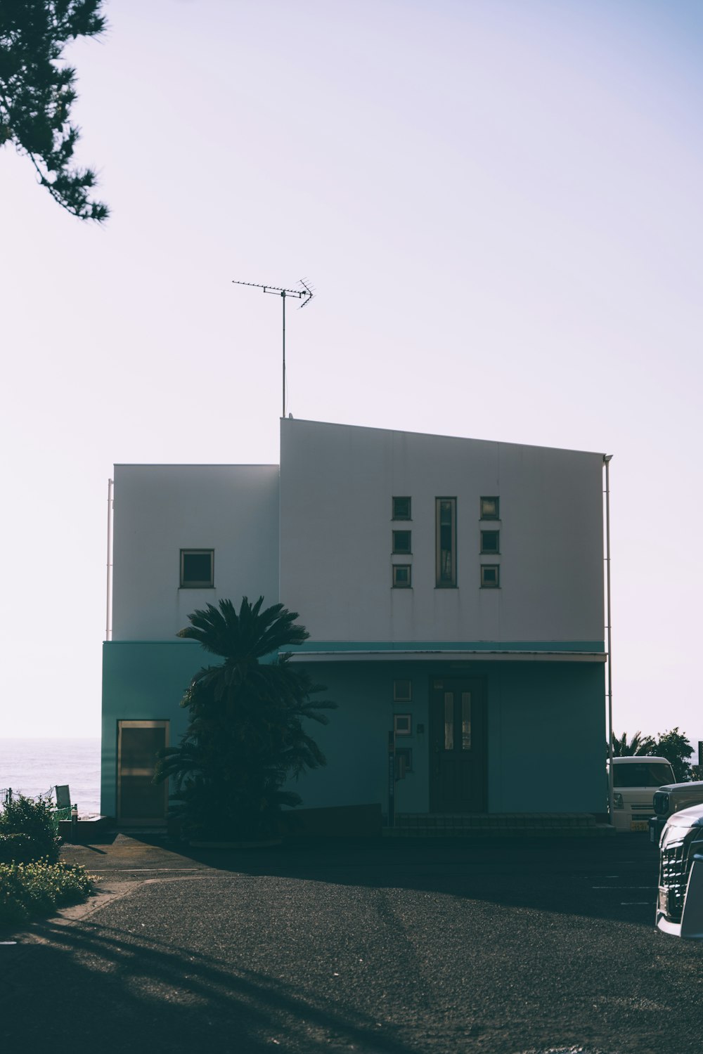 a building with a tower in the background