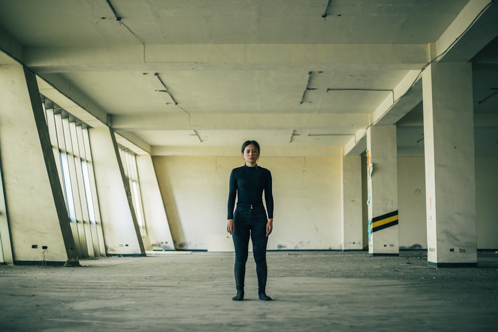 a man standing in a large empty room