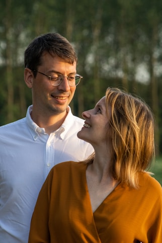 a man and woman kissing