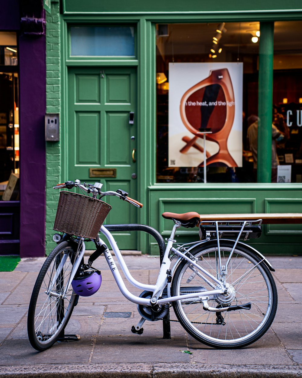 a bicycle parked in front of a store