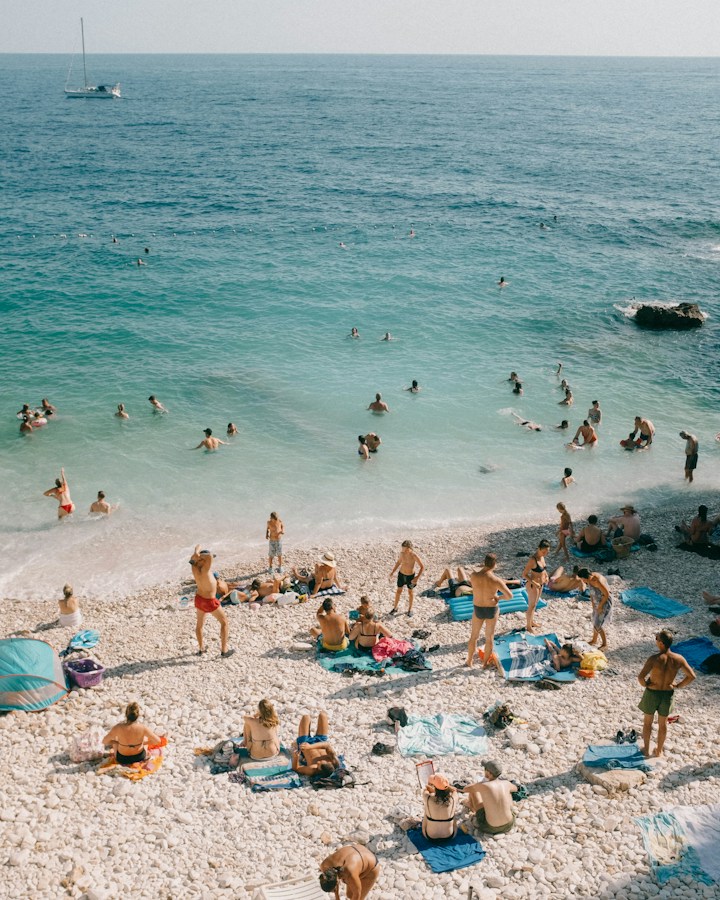 Turquoise shallows and a pebble beach seen from above