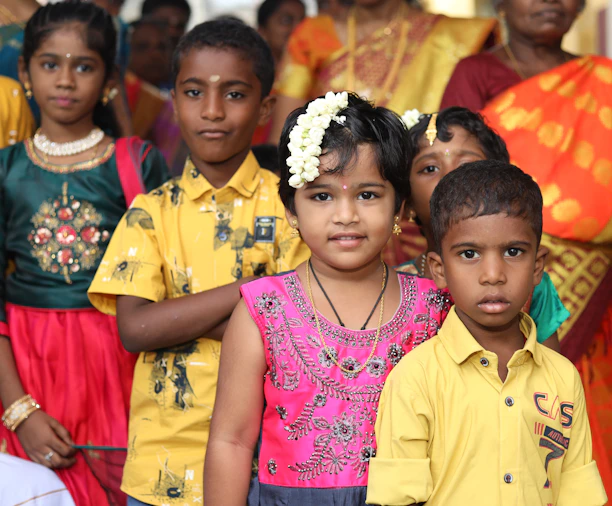 a group of children posing for a photo