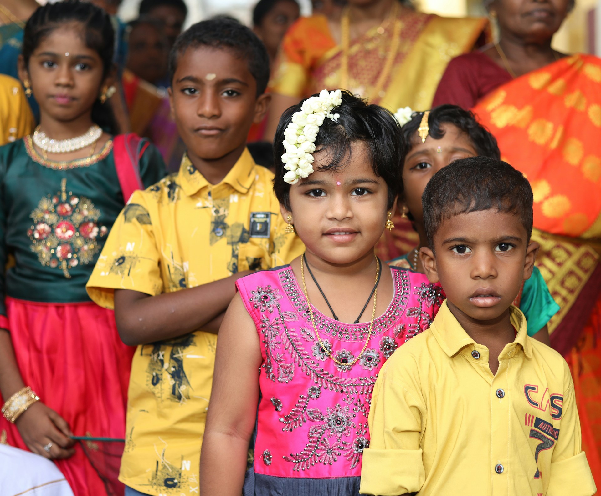 a group of children posing for a photo