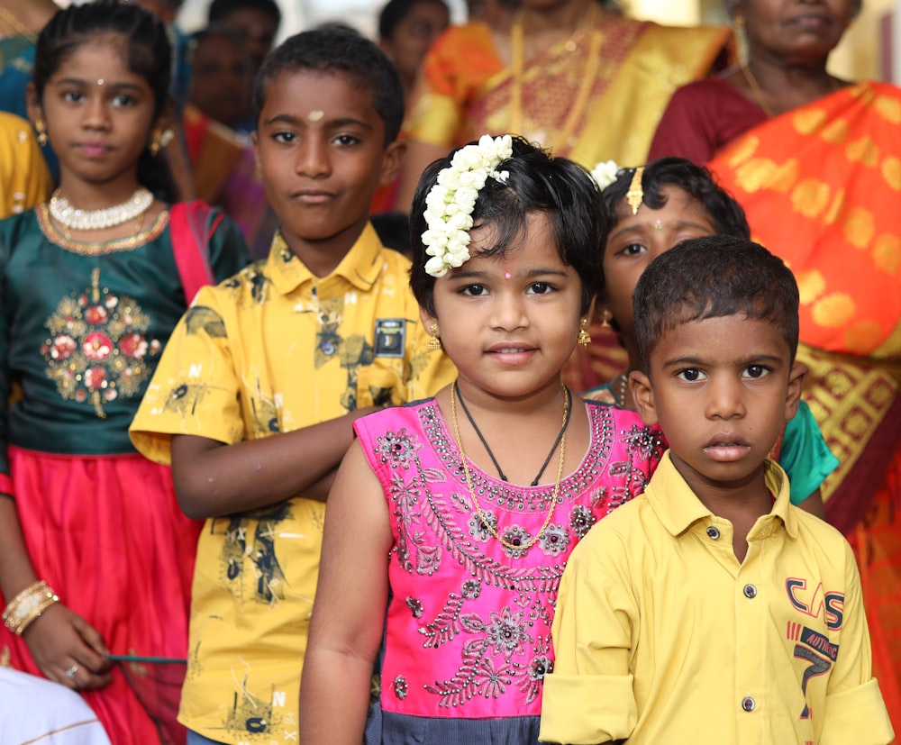 a group of children posing for a photo