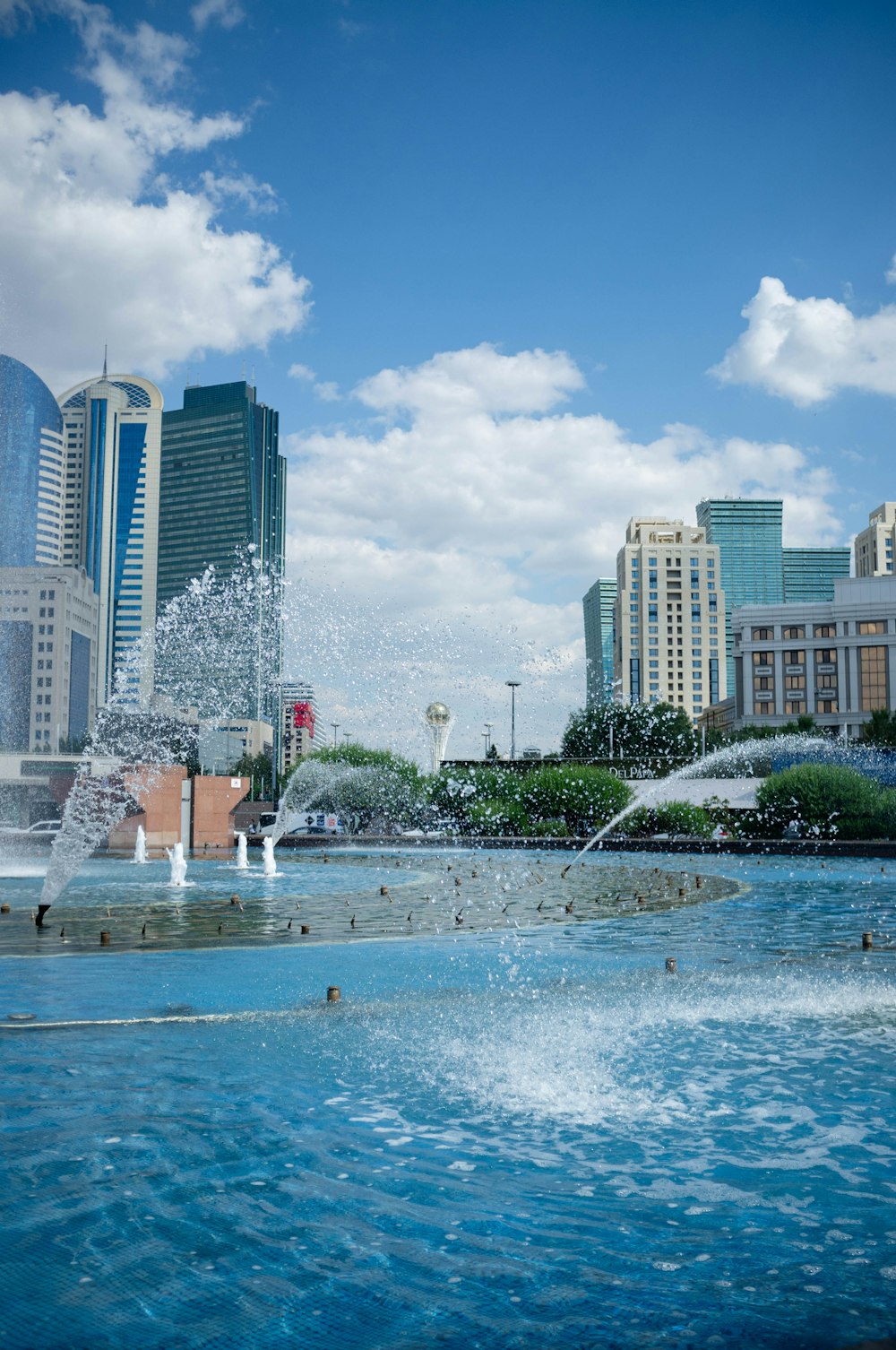 a large fountain in a city