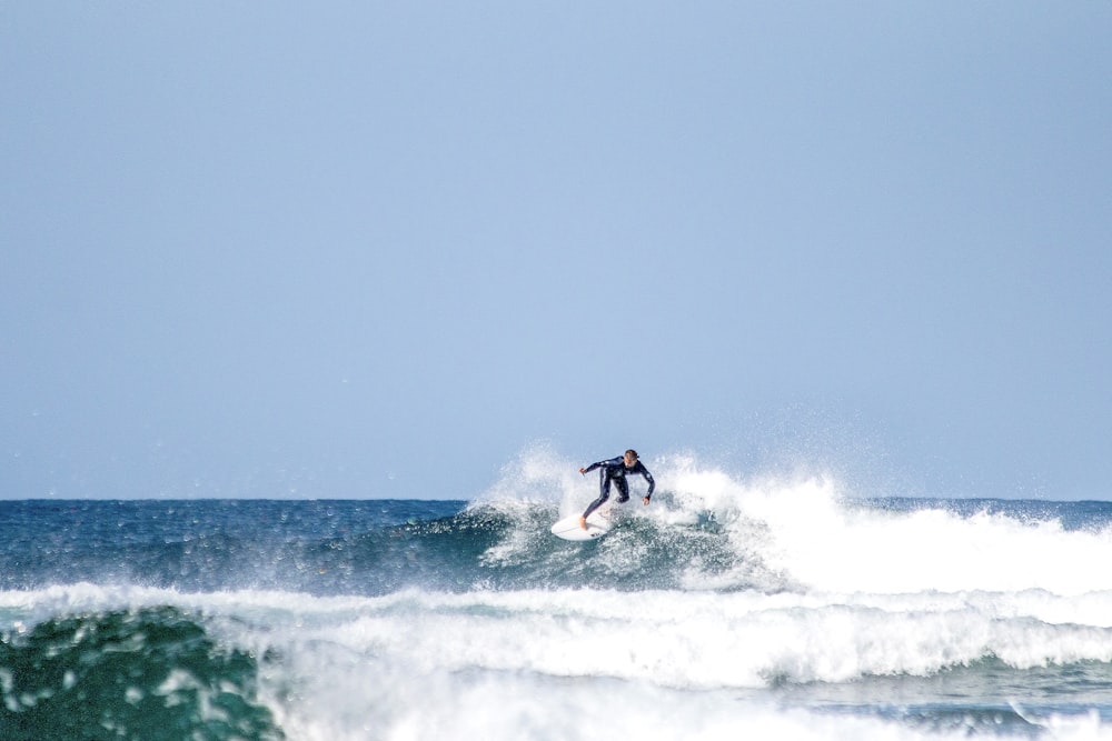 a surfer riding a wave