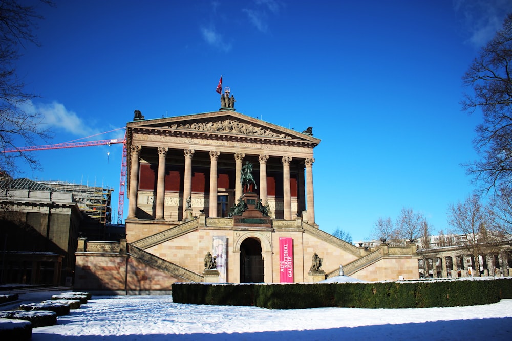 Alte Nationalgalerie with pillars and a flag on top