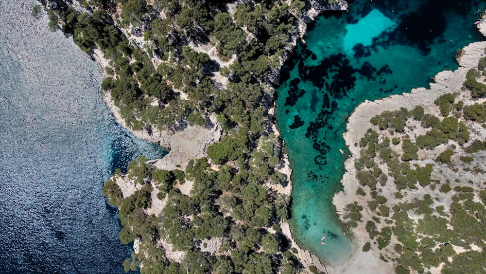 a body of water with land in the back