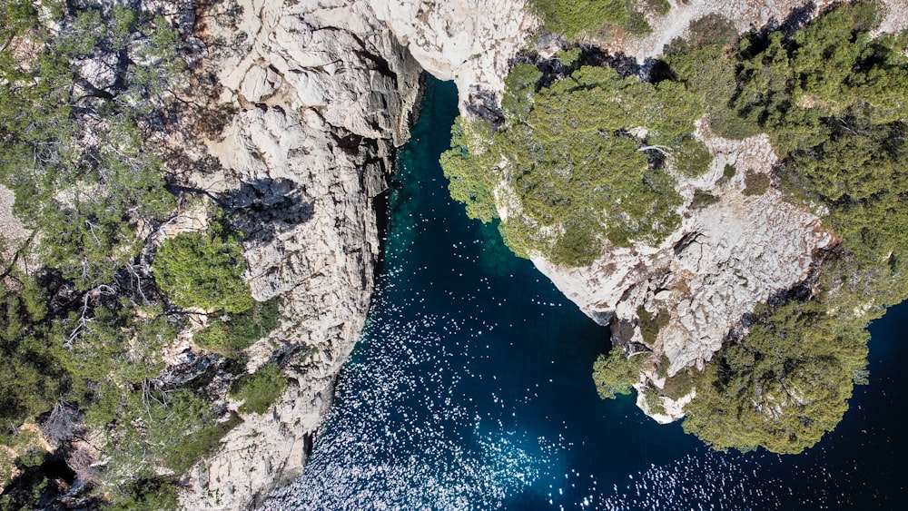 a river flowing between rocky cliffs