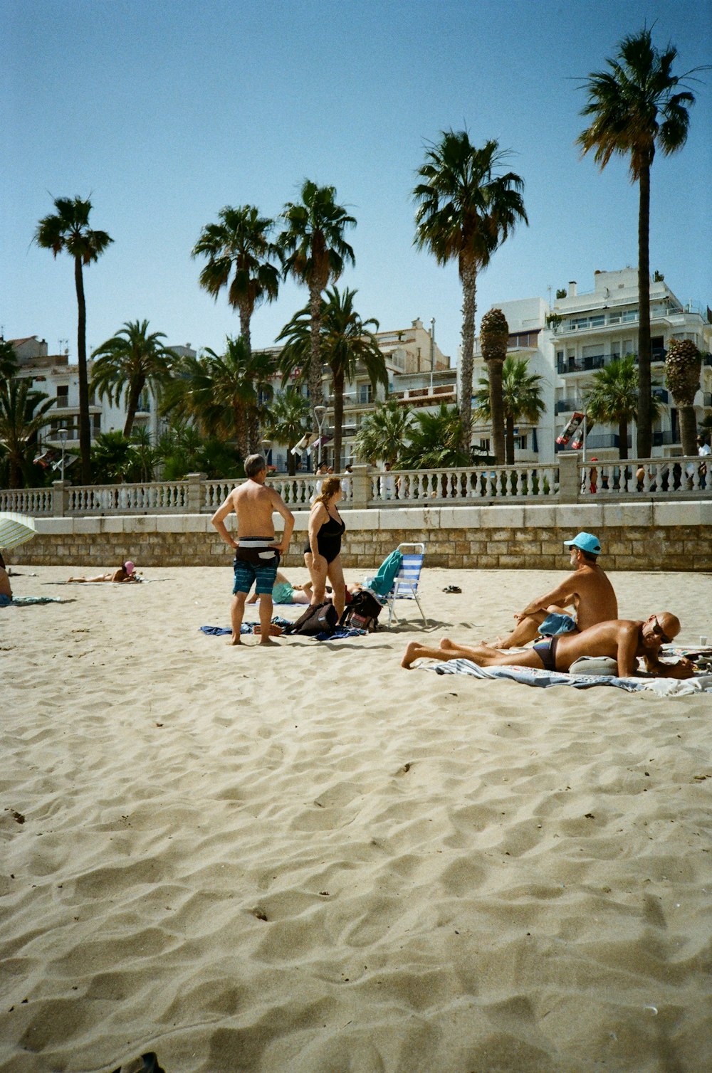 a group of people on a beach