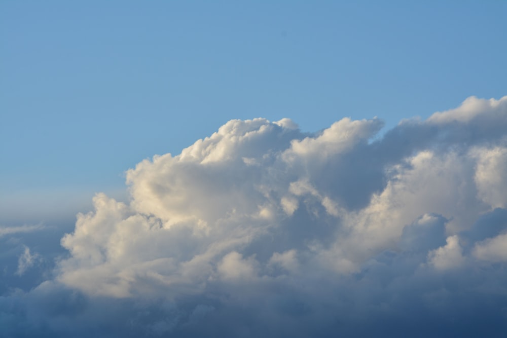 a blue sky with white clouds