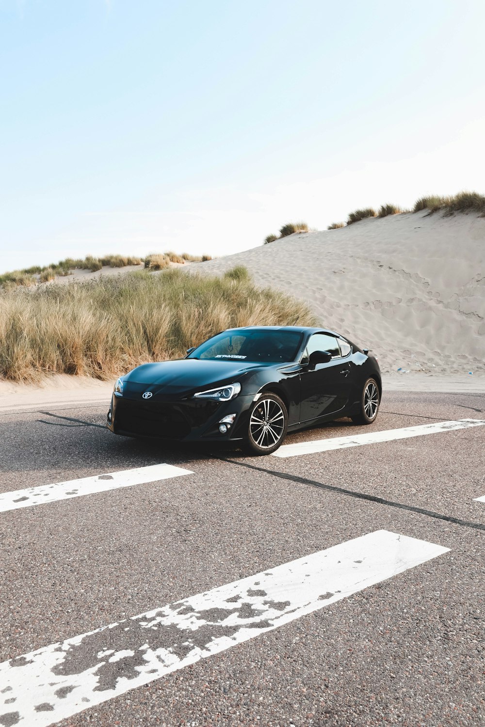 a black car on a road