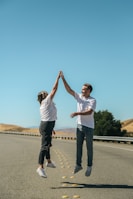 a man and a woman holding hands