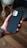 A happy customer holding a stylish mobile phone case from Silmart LLC.