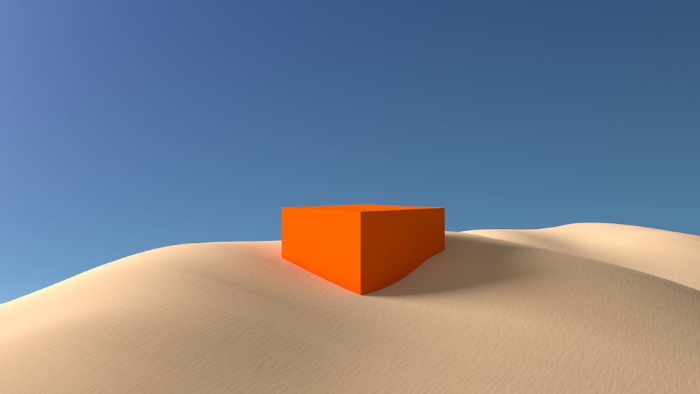 a sand dune with a blue sky