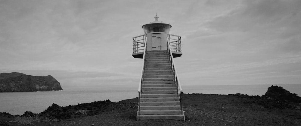 a lighthouse on a rocky shore