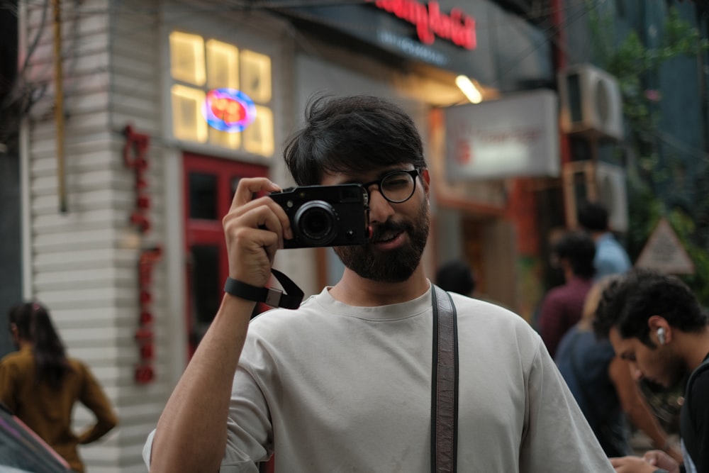 a man holding a camera