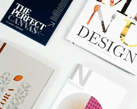 Brand design materials laid out on a desk