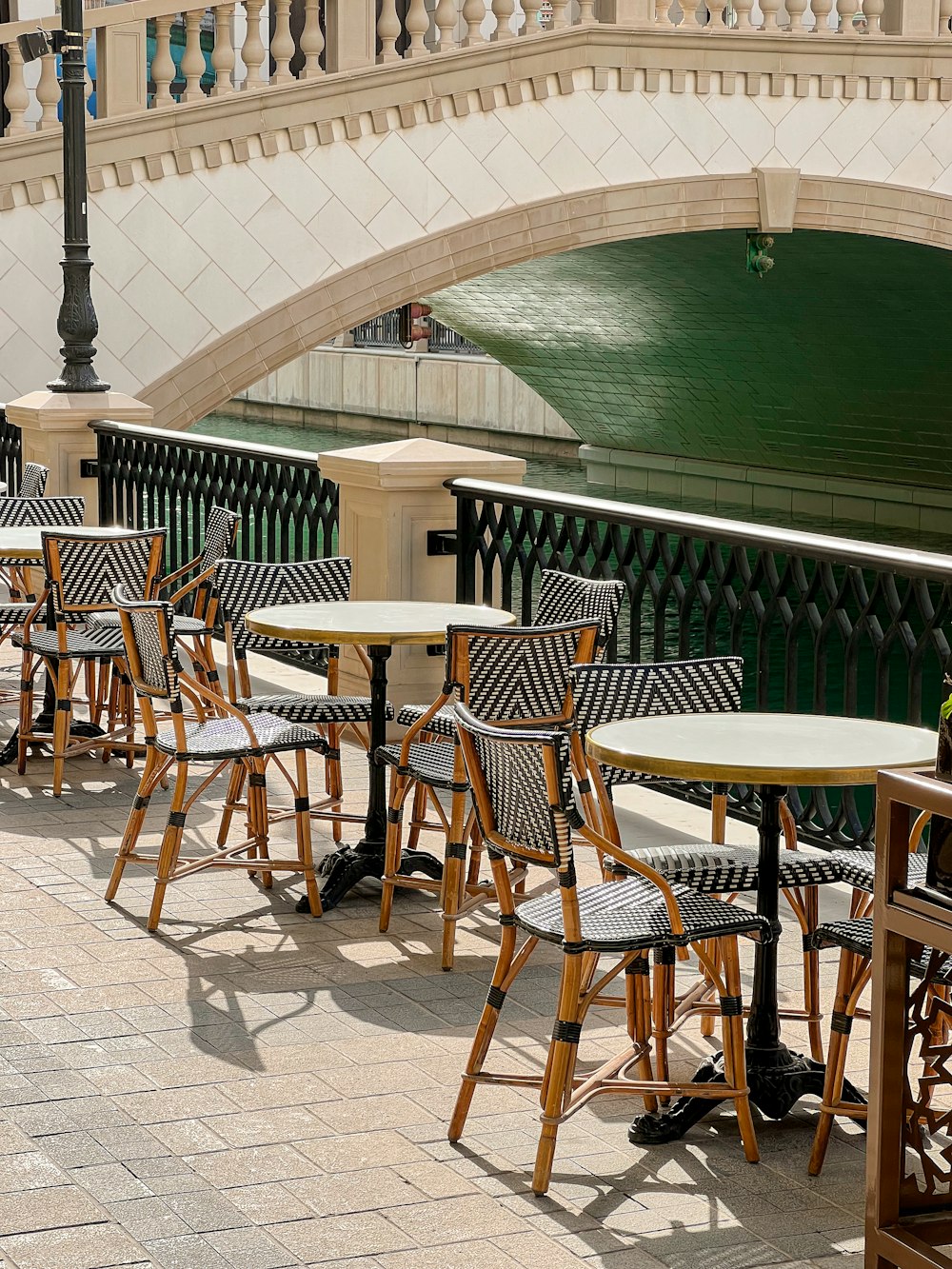 a group of tables and chairs outside