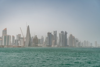 a city skyline across the water