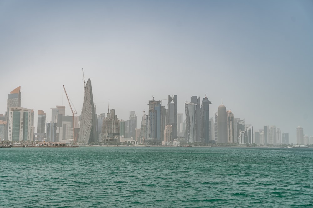 a city skyline across the water