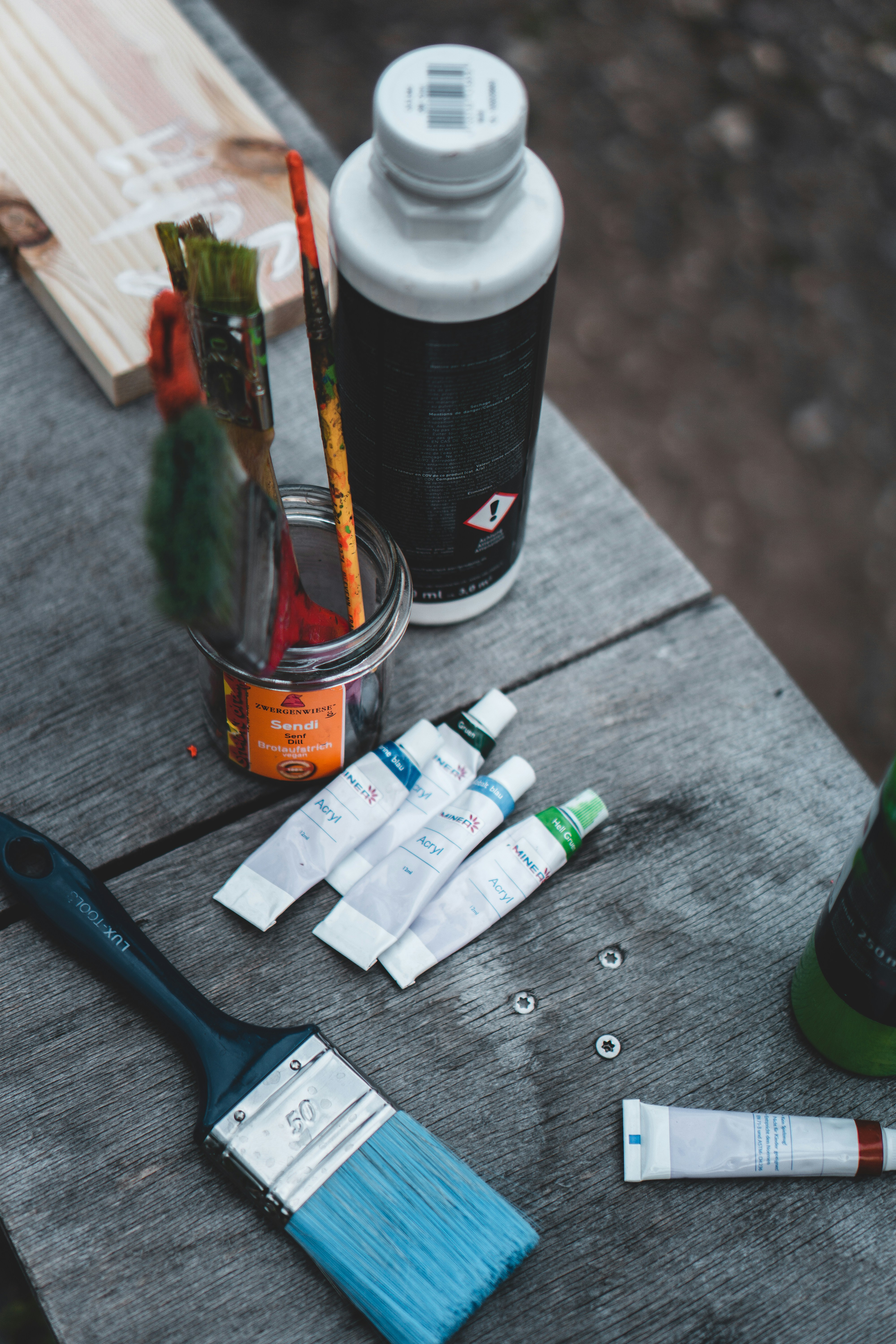 a bottle of water and other objects on a table