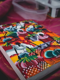 a colorful fabric with a black and white design